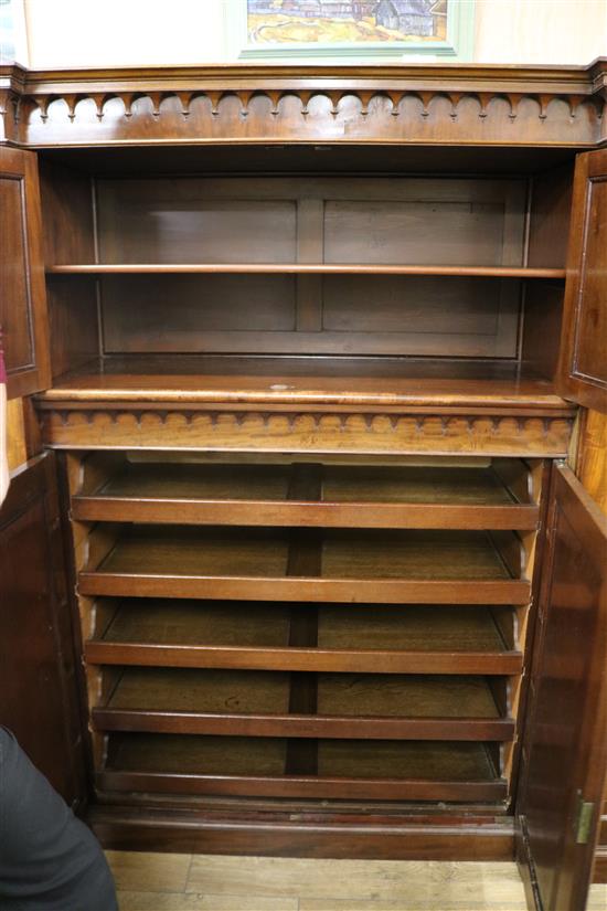 A Victorian mahogany inverted breakfront wardrobe W.218cm